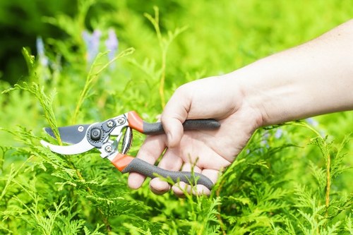 First aid kit and communication device ready in a lawn maintenance vehicle